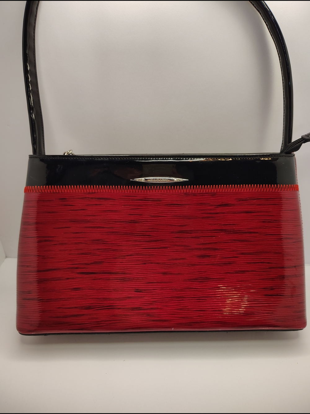 Red and Black East West Smooth Red Barrell Hand Bag